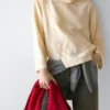 Asymmetrisches Hemd mit Knopfleiste Asymmetrisches Hemd mit Knopfleiste