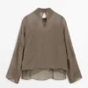 Bestickte, halbtransparente Bluse