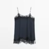 Camisole-Top mit kontrastierenden Spitzendetails Camisole-Top mit kontrastierenden Spitzendetails