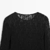 Durchbrochenes Strickoberteil mit langen Ärmeln und Spitze Durchbrochenes Strickoberteil mit langen Ärmeln und Spitze