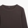Geripptes Langarm-T-Shirt in Melange Geripptes Langarm-T-Shirt in Melange