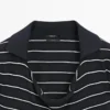 Gestreiftes Poloshirt aus Baumwollstrick Gestreiftes Poloshirt aus Baumwollstrick