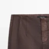 Gewachste Hose mit ausgestelltem Schnitt Gewachste Hose mit ausgestelltem Schnitt