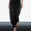 Halbtransparente Sarouel-Hose mit Knopfdetails