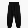 Halbtransparente Sarouel-Hose mit Knopfdetails