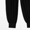 Halbtransparente Sarouel-Hose mit Knopfdetails