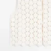 Häkel-Weste aus Baumwolle mit floralen Details Häkel-Weste aus Baumwolle mit floralen Details