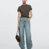 Jeans mit hoher Taille und Barrel-Passform Jeans mit hoher Taille und Barrel-Passform