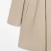 Karierter Mäntel aus Baumwolle mit Details im Inneren Karierter Mäntel aus Baumwolle mit Details im Inneren