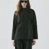 Kurzer, wattierter Parka mit Kragen Kurzer, wattierter Parka mit Kragen