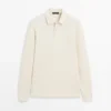 Langärmliges Poloshirt aus merzerisierter Baumwolle Langärmliges Poloshirt aus merzerisierter Baumwolle