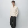 Langärmliges Poloshirt mit gerippten Details Langärmliges Poloshirt mit gerippten Details