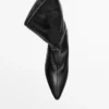 Leder-Stiefeletten mit hohem Absatz Leder-Stiefeletten mit hohem Absatz