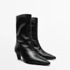 Leder-Stiefeletten mit hohem Absatz Leder-Stiefeletten mit hohem Absatz