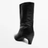 Leder-Stiefeletten mit hohem Absatz Leder-Stiefeletten mit hohem Absatz