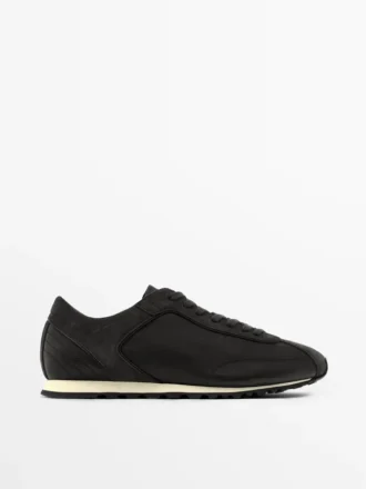 Ledersneaker mit dünner Sohle