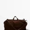 Maxi-Reisetasche aus Wildleder Maxi-Reisetasche aus Wildleder