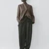 Mäntel aus melierter Wollmischung mit hohem Kragen Mäntel aus melierter Wollmischung mit hohem Kragen