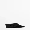 Mules mit Keilabsatz