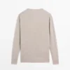 Oversize-Strickpullover mit V-Ausschnitt Oversize-Strickpullover mit V-Ausschnitt