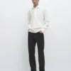 Piqué-Poloshirt mit langen Ärmeln und Knopfleiste Piqué-Poloshirt mit langen Ärmeln und Knopfleiste