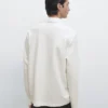 Piqué-Poloshirt mit langen Ärmeln und Knopfleiste Piqué-Poloshirt mit langen Ärmeln und Knopfleiste