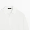 Piqué-Poloshirt mit langen Ärmeln und Knopfleiste Piqué-Poloshirt mit langen Ärmeln und Knopfleiste