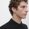 Poloshirt aus 100 % Baumwolle mit Zopfmuster Poloshirt aus 100 % Baumwolle mit Zopfmuster