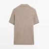 Poloshirt aus Baumwollmischung mit Zopfmuster Poloshirt aus Baumwollmischung mit Zopfmuster