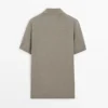 Pullover aus Baumwollstrick mit Poloshirt-Ausschnitt Pullover aus Baumwollstrick mit Poloshirt-Ausschnitt
