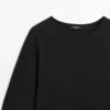 Pullover mit kontrastierenden Spitzendetails Pullover mit kontrastierenden Spitzendetails
