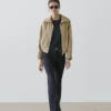Skinny-Jeans mit hoher Taille und ausgestelltem Bein Skinny-Jeans mit hoher Taille und ausgestelltem Bein