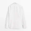 Slim-Fit-Hemd aus 100 % Baumwolle Slim-Fit-Hemd aus 100 % Baumwolle