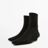 Stiefeletten mit Keilabsatz aus Spaltleder Stiefeletten mit Keilabsatz aus Spaltleder