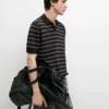 Strick-Poloshirt mit Kontraststreifen Strick-Poloshirt mit Kontraststreifen