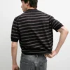 Strick-Poloshirt mit Kontraststreifen Strick-Poloshirt mit Kontraststreifen