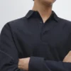 Strukturiertes Piqué-Poloshirt mit langen Ärmeln Strukturiertes Piqué-Poloshirt mit langen Ärmeln