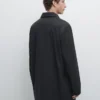 Trenchcoat aus wasserabweisendem Material Trenchcoat aus wasserabweisendem Material