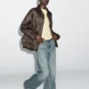 Wasserabweisende Daunenjacke mit Cord-Details Wasserabweisende Daunenjacke mit Cord-Details